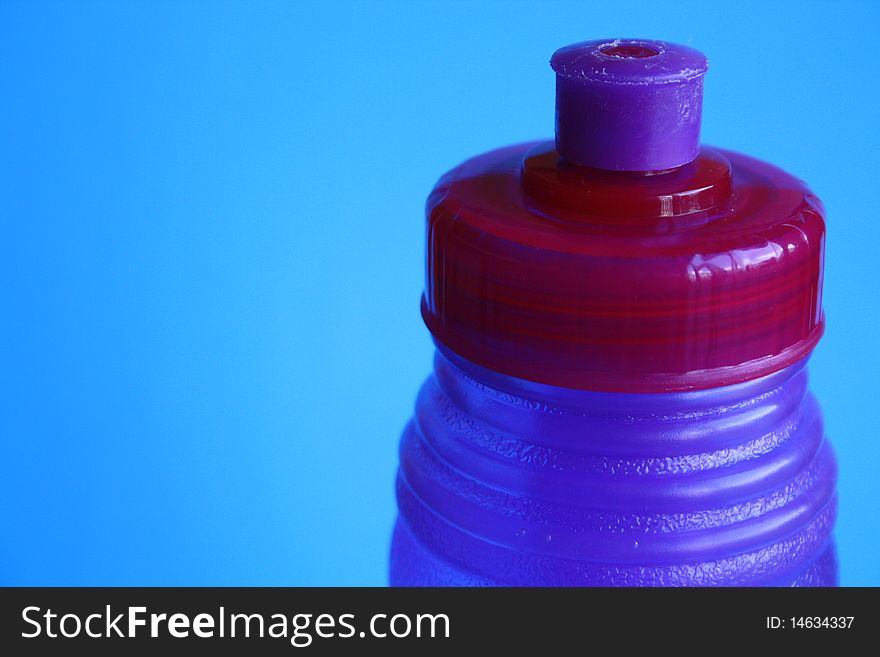 Purple and pink water bottle with pull top