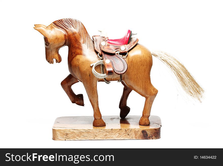 Small toy wooden horse isolated