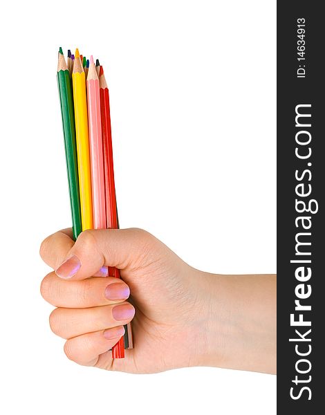 Hand with multicolored pencils isolated on white background