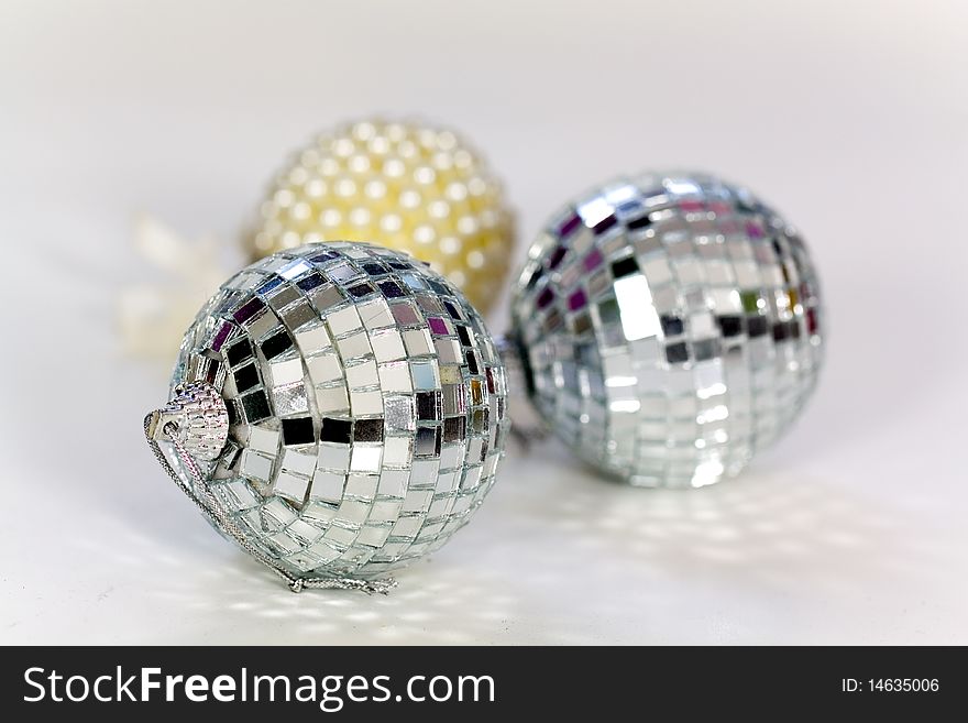 Close up,three silver white Christmas ornaments