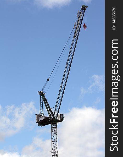 Crane for construction work on blue sky background