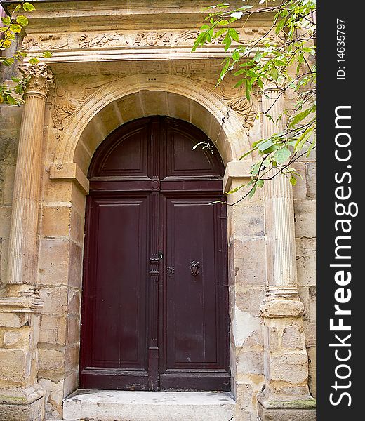 Doorway with ornate archway, typical of Paris. Doorway with ornate archway, typical of Paris
