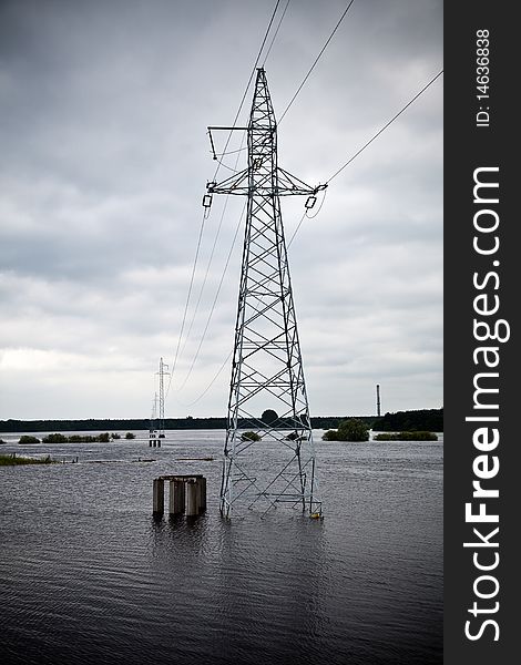 Flooded by river power lines landscape. Flooded by river power lines landscape