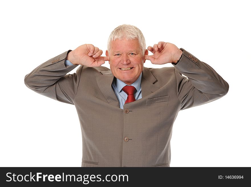 Successful mature business man on white background, covering ears. Successful mature business man on white background, covering ears