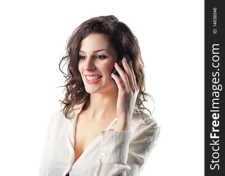 Smiling woman talking to telephone. Smiling woman talking to telephone