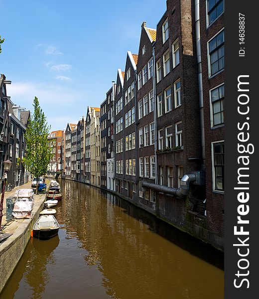 Tourist boat in the beautiful Amsterdam Canals