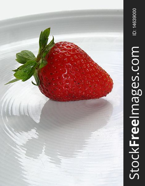 Strawberry On White Dish