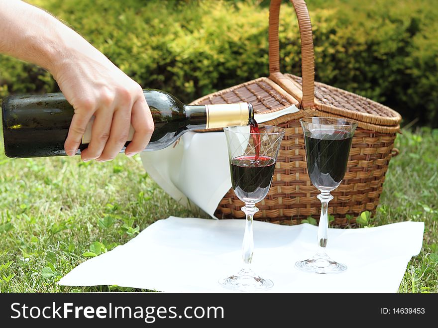 Outdoor picnic setting with wine. Outdoor picnic setting with wine