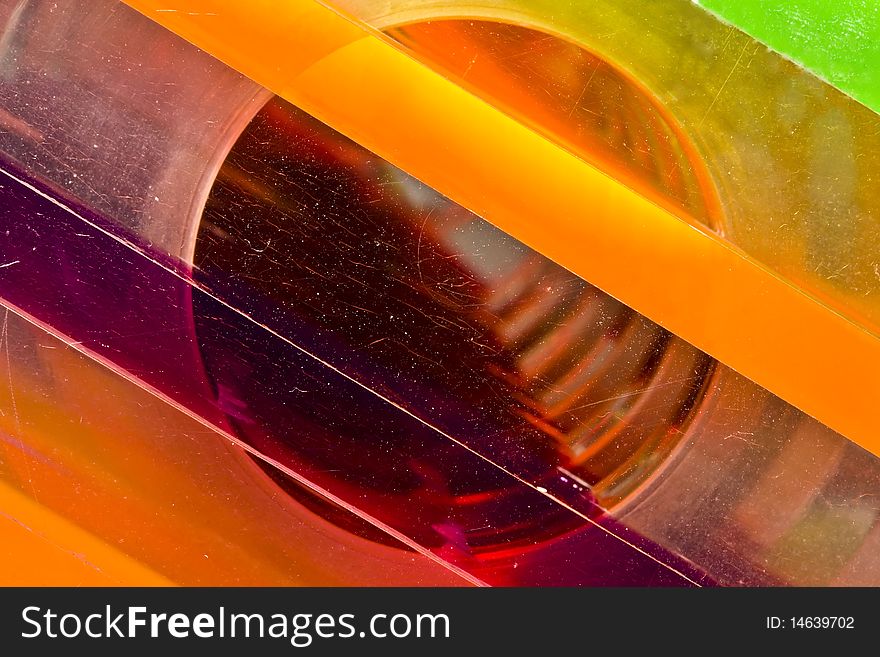 Close up of a colorful piece of plexiglas. Close up of a colorful piece of plexiglas