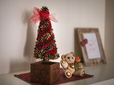 Christmas Decorations, Ornaments And Wooden Photo Frame On A Furniture In The House Stock Images