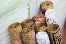 Kraft Paper Rolls With Vintage Bag For Gift Wrapping Stock Image
