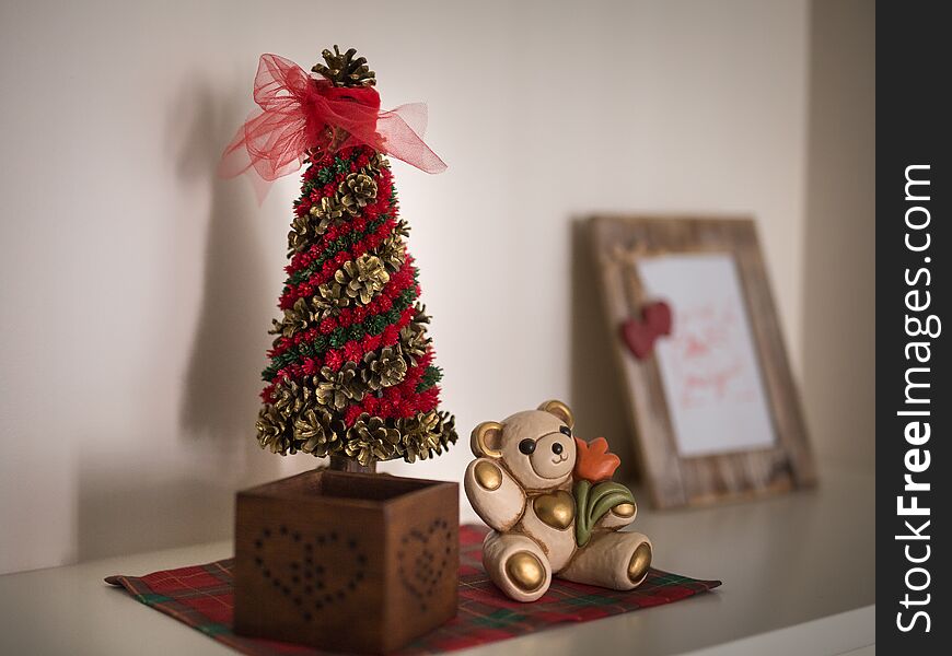 Christmas Decorations, Ornaments and Wooden Photo Frame on a Furniture in the House