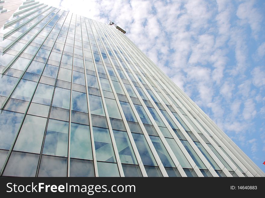 Architectural details of a modern glass wall of an office building. Architectural details of a modern glass wall of an office building