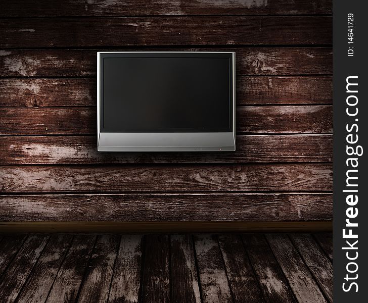 Wooden grunge interior with LCD tv