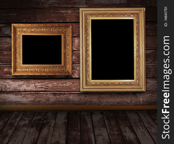 Wooden grunge interior with picture frames