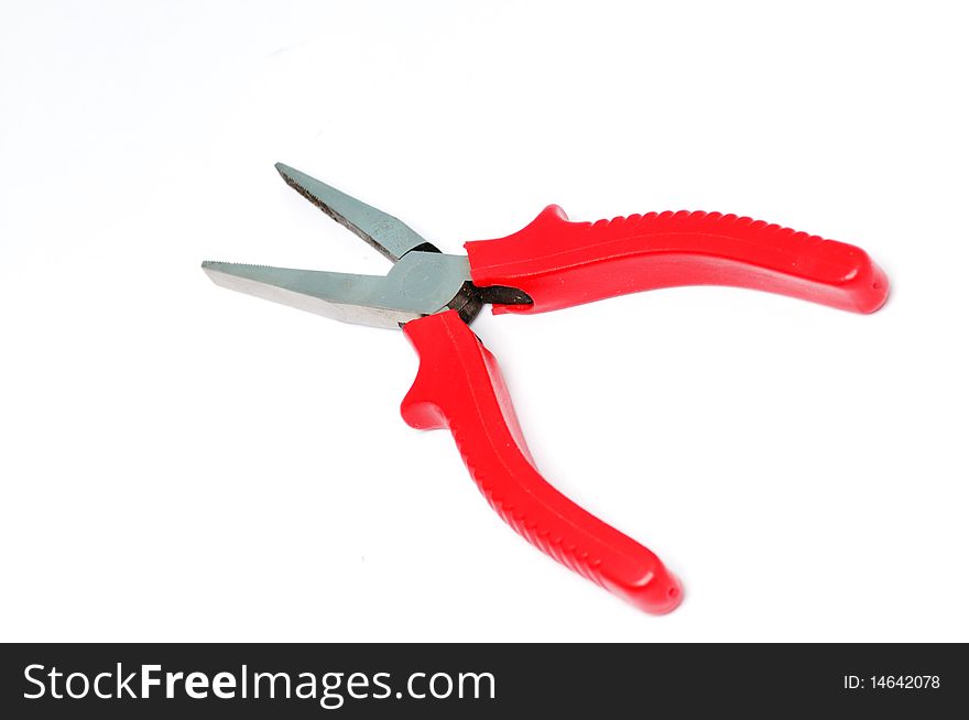 Red handle pliers on a white background .