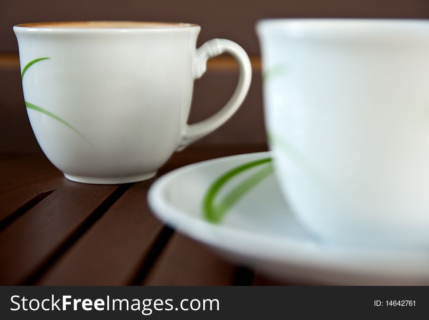 Coffee and tea in white ceramic cup. Coffee and tea in white ceramic cup