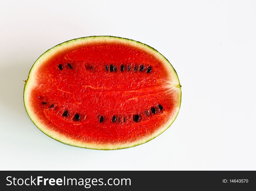 Half cutting of watermelon with horizontal shot. Half cutting of watermelon with horizontal shot