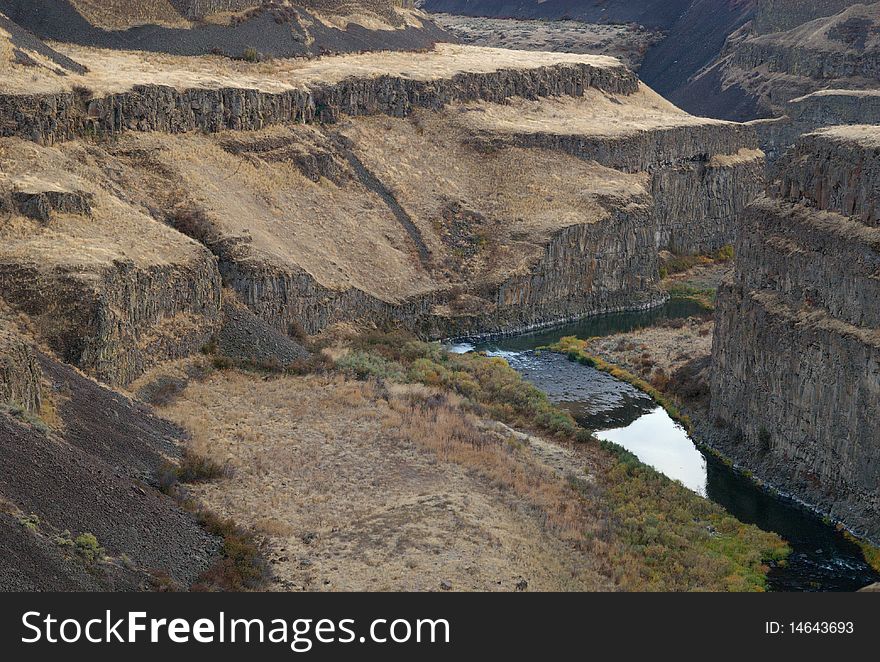 The Palouse River, winding its way through a dry desert canyon before it flows into the Snake River, Washington. The Palouse River, winding its way through a dry desert canyon before it flows into the Snake River, Washington