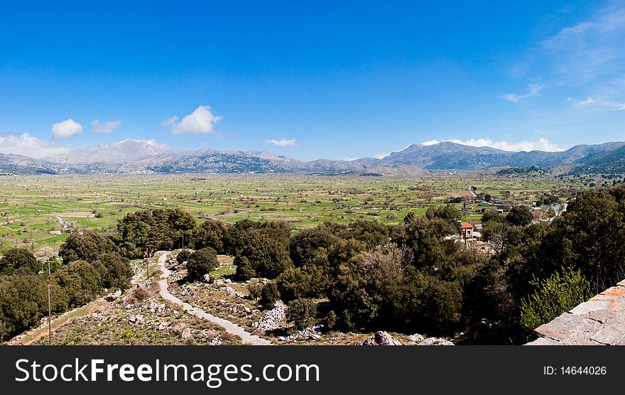 Panoramic landscape of Lasithi Plateau in spring in Crete island, Greece