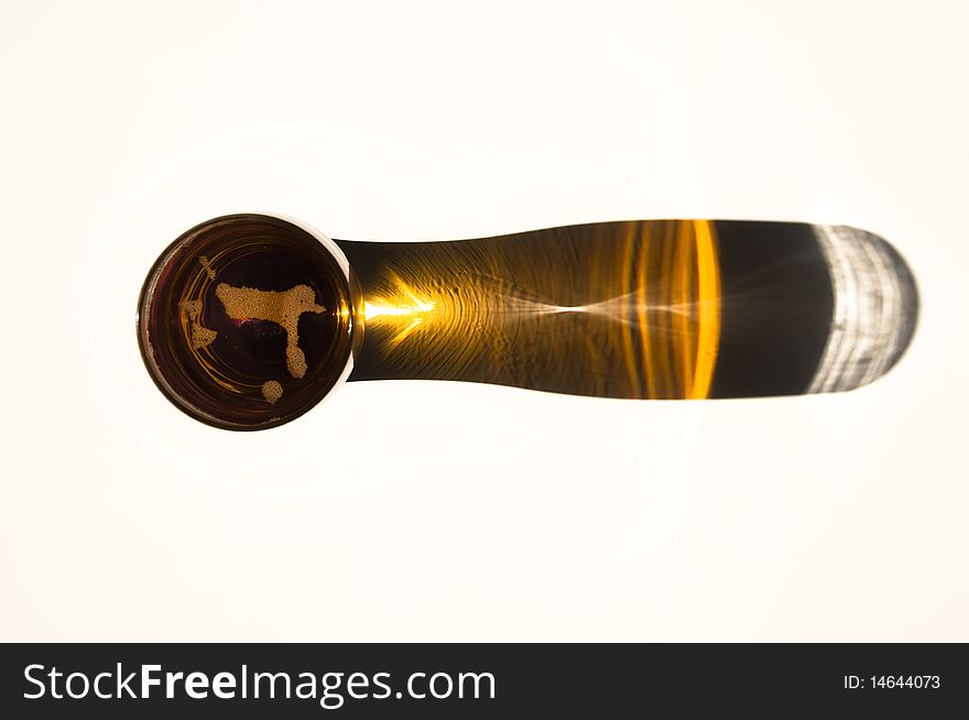 Beer shadow background with golden beer