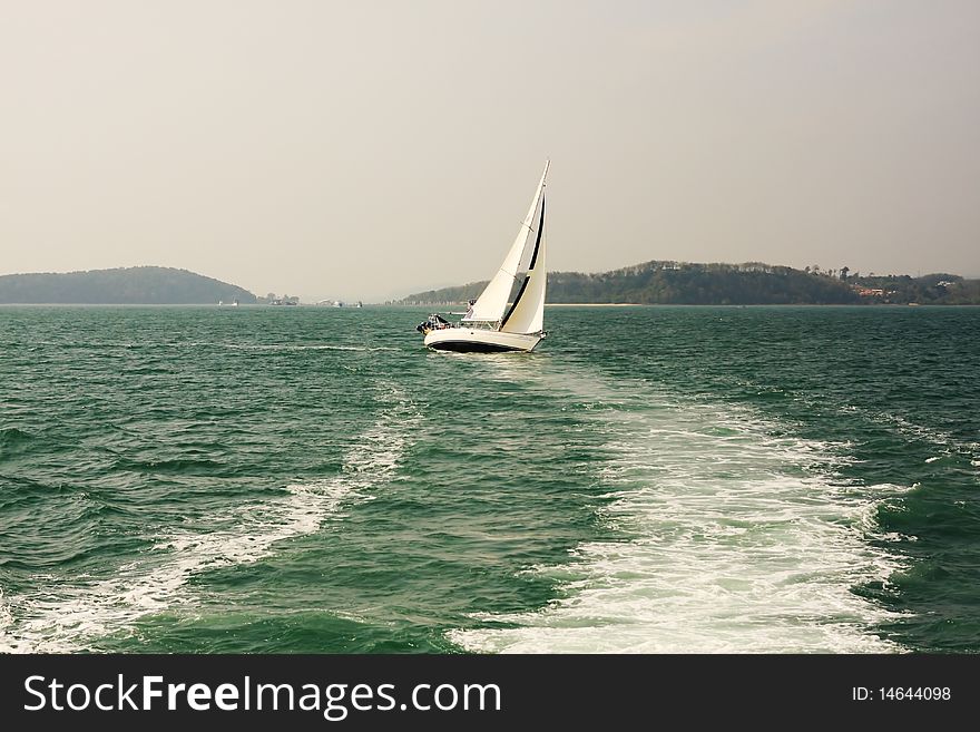 Alone yacht in the ocean