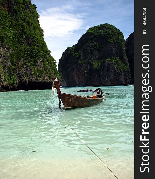 Small traditional boat on the sea of Maya Bay, Thailand. Small traditional boat on the sea of Maya Bay, Thailand