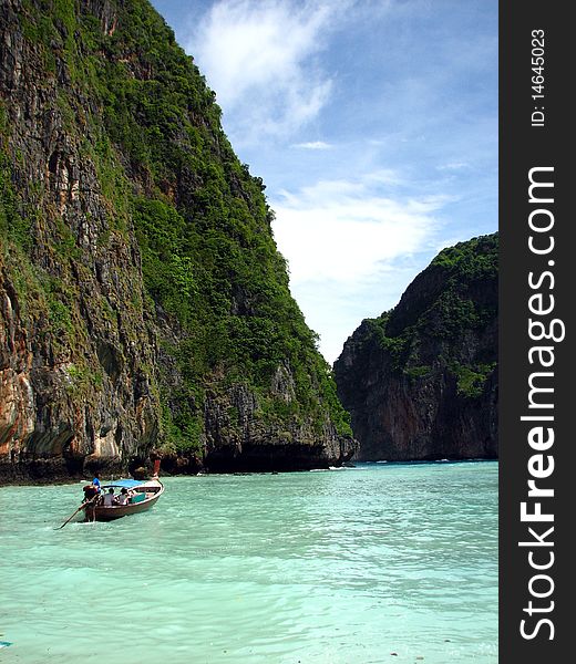 Small traditional boat on the sea of Maya Bay, Thailand. Small traditional boat on the sea of Maya Bay, Thailand