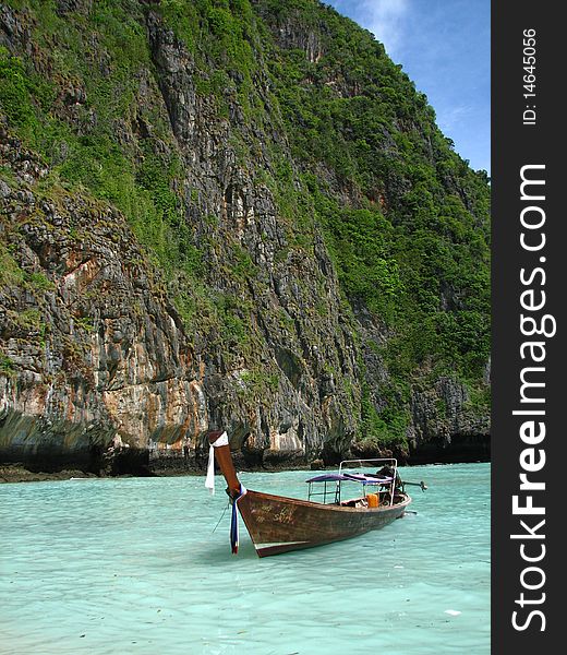 Small traditional boat on the sea of Maya Bay, Thailand. Small traditional boat on the sea of Maya Bay, Thailand