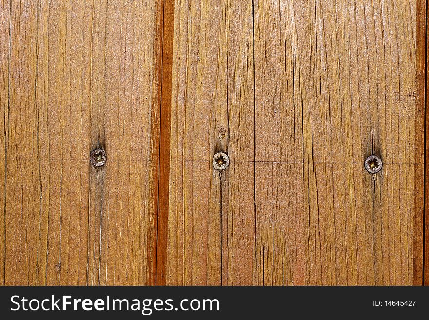 Wood door detail with screws