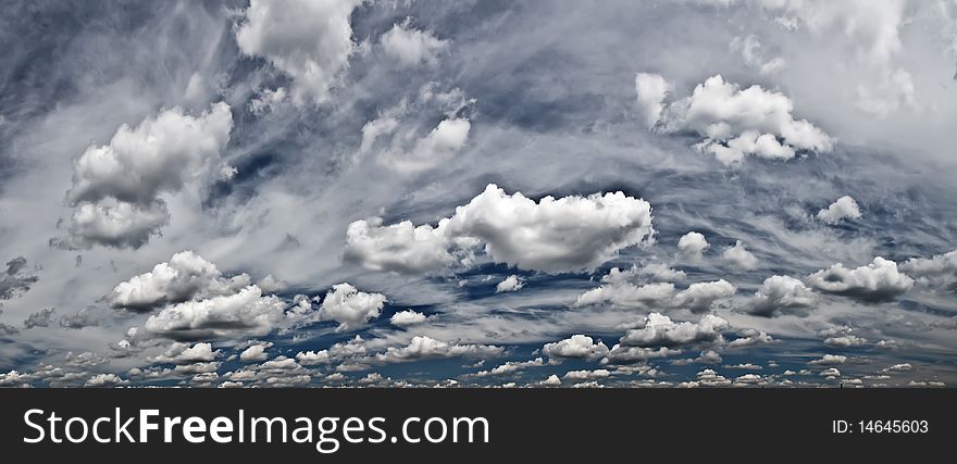 Dramatic clouds on the blue sky