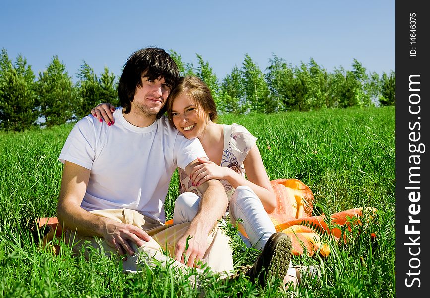 Boy And Girl On Grass