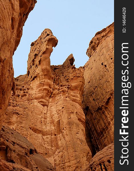 Picturesque orange weathered rocks low angle view