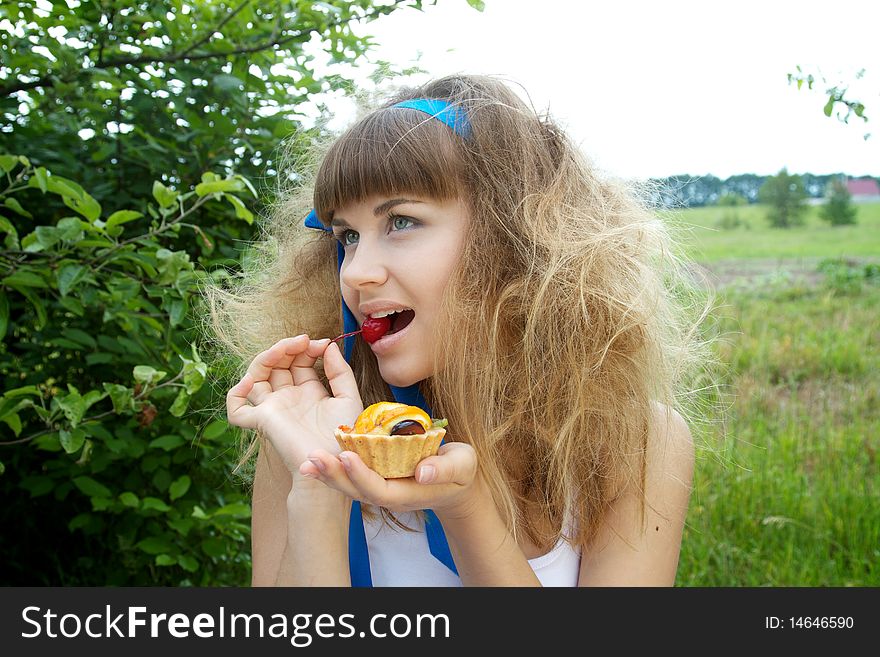 Beautiful Girl Holding Cake