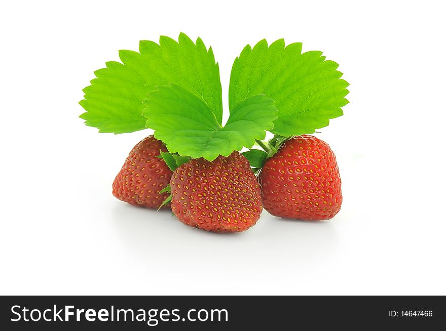 Strawberry with leafs isolated on white