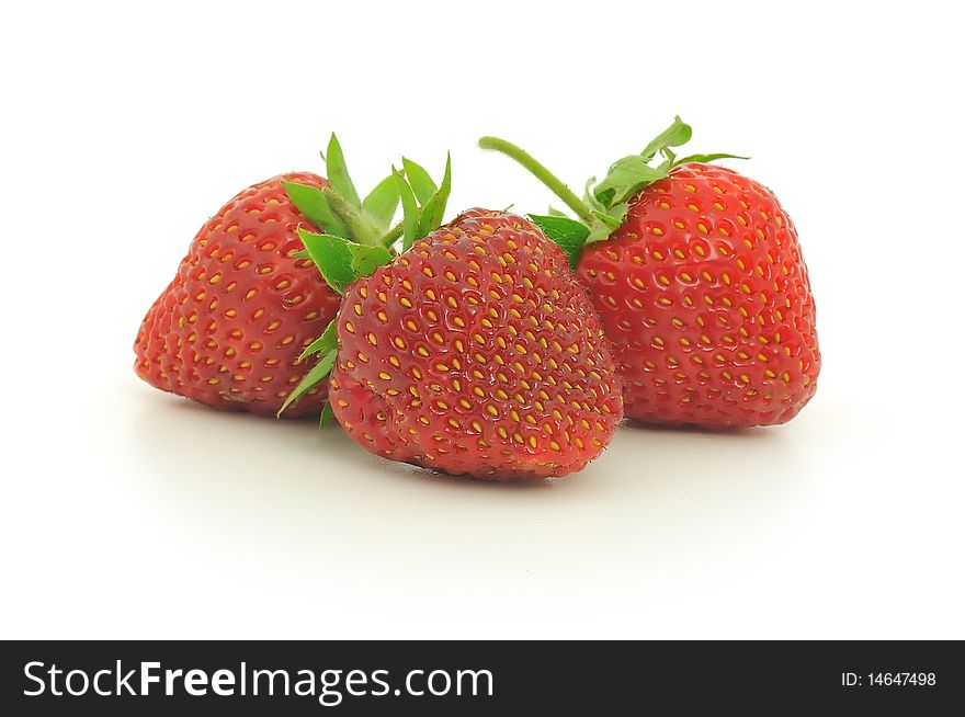 Fresh ripe red strawberries, isolated on white with soft shadow