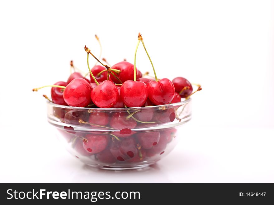 Fresh Cherries On A Glass Plate, On A White Background