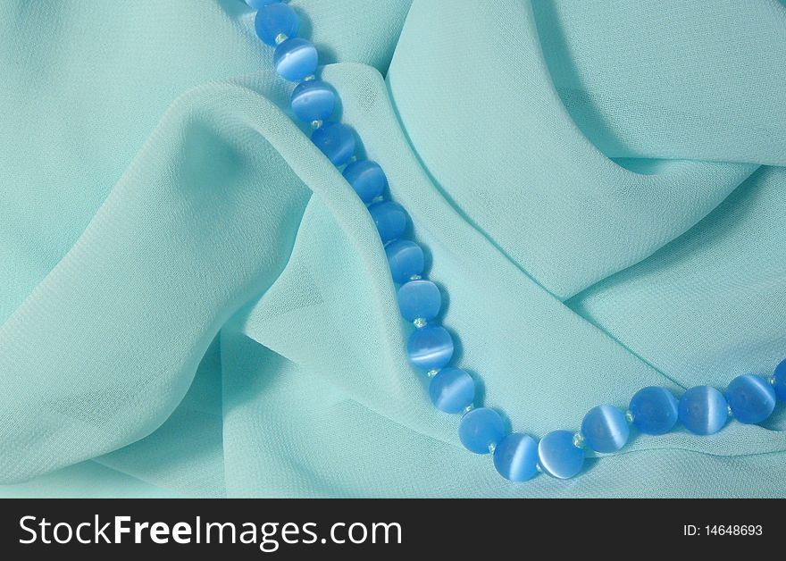 Smooth elegant and very nice and beautiful silk fabric with pearls ,background. Smooth elegant and very nice and beautiful silk fabric with pearls ,background