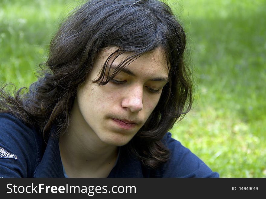 Portrait of a boy with long hair. Portrait of a boy with long hair