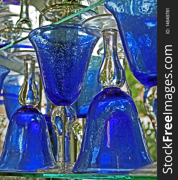 Blue bubble goblets on a store shelf. Blue bubble goblets on a store shelf