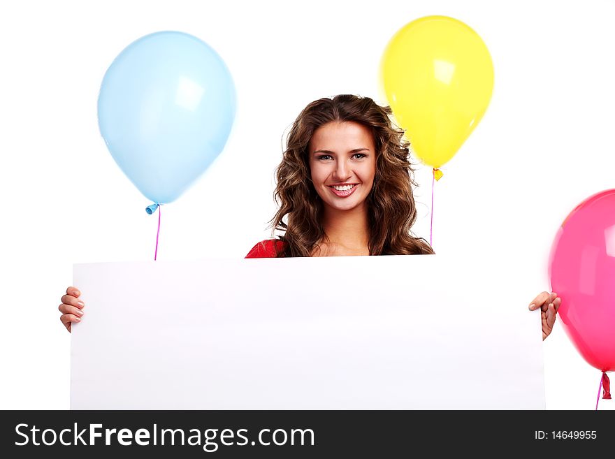 Young woman with colored balloons and white placard. Young woman with colored balloons and white placard