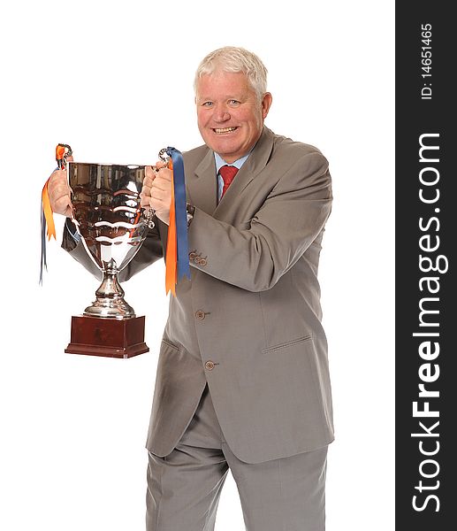 Successful mature business man on white background, holding trophy. Successful mature business man on white background, holding trophy