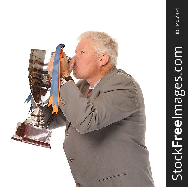 Successful mature business man on white background, holding trophy. Successful mature business man on white background, holding trophy