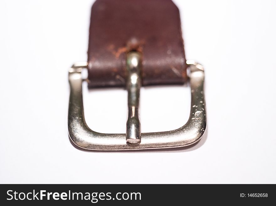 Close up of old leather belt on white background