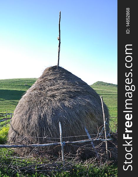 Hay rick with background of bkue sky