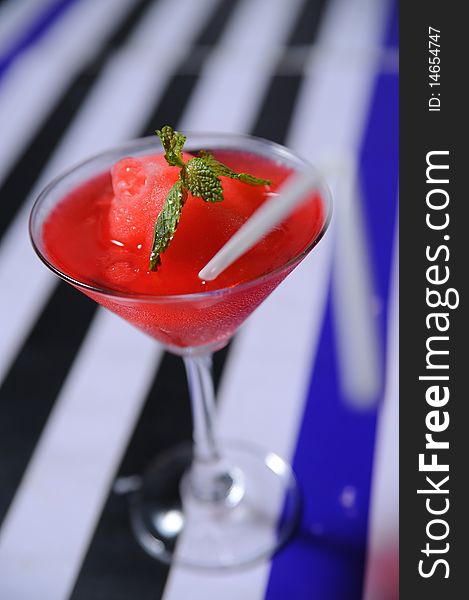 Red cocktail and background studio