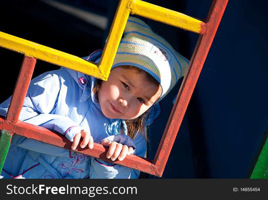 Girl Looking Through Coloured Zigzag