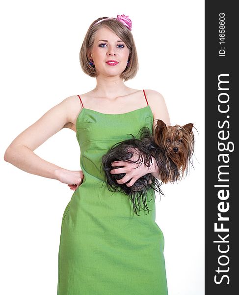 Beauty young woman in green dress with dog