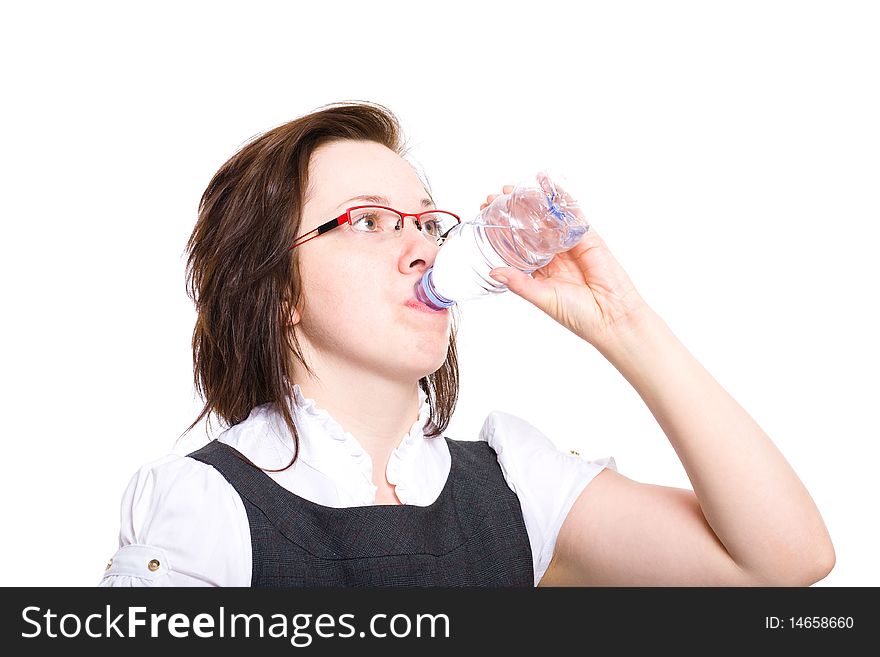 Young Female Drinks Water From Plastic Bottle