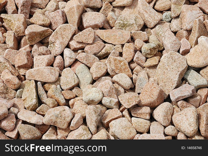Many granitic pebble on beach